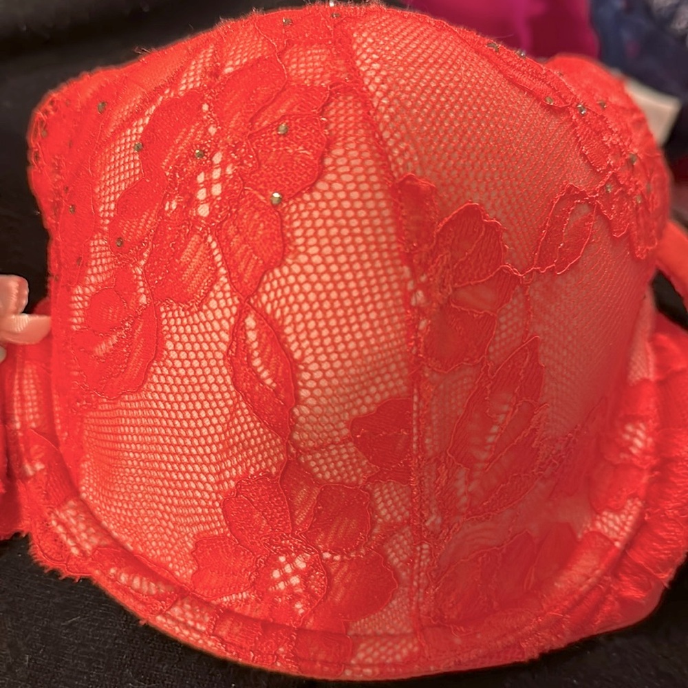 Coral VS bra with rhinestone embellishments.